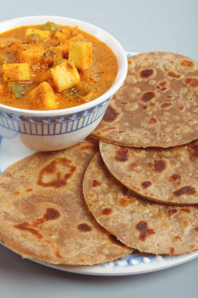 istock Home made Paneer Butter Masala with chapathi 1134821419