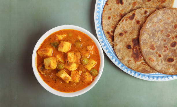 istock Home made Paneer Butter Masala with chapathi 1134821420