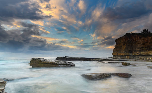 istock Rocky Seascape with Dark Clouds 1134826207