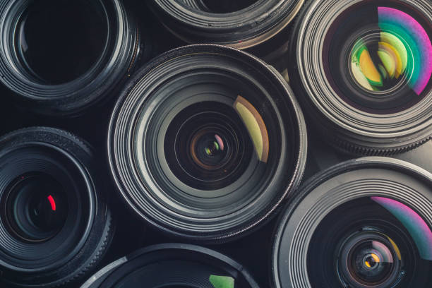 istock Set of various DSLR lenses with colorful reflections 1134834501
