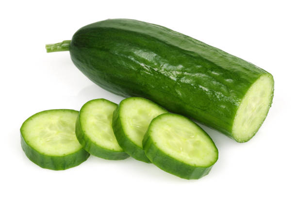 istock Fresh cucumber slices isolated on white 1134834583