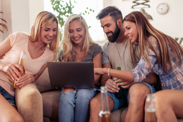 istock Friends enjoying together at home 1134835322
