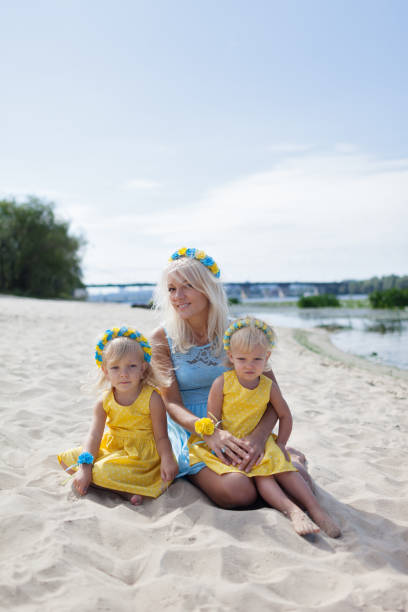 istock Mother and daughters on beautiful summer day 1134835544