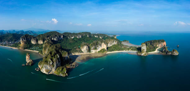 View from above, stunning panoramic aerial view of Krabi most famous beaches, Phra Nang Beach, Railey Beach, Ton sai Bay Beach and the beautiful rock formation Ao Nang Tower, Ao Nang, Krabi, Thailand. View from above, stunning panoramic aerial view of Krabi most famous beaches, Phra Nang Beach, Railey Beach, Ton sai Bay Beach and the beautiful rock formation Ao Nang Tower, Ao Nang, Krabi, Thailand. koh poda stock pictures, royalty-free photos & images
