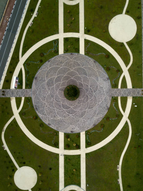 istock Creative arial photo of white ring on the green Earth. Patterns on the ground. Krasnaya Polyana, Gorki Gorod, Sochi district, Russia. 1134840077