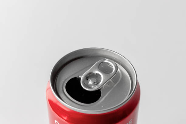 istock closeup metallic can on white table with soft-focus and over light in the background 1134840874