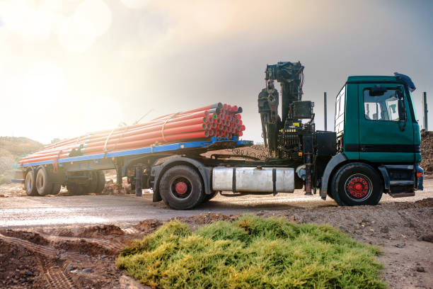 istock maneuver with a truck on the construction site 1134843435