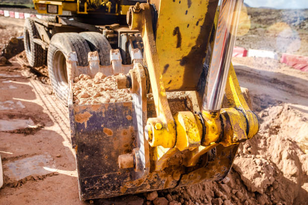 istock close up on an excavator in action 1134843695