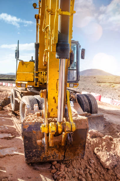 istock close up on an excavator in action 1134844711