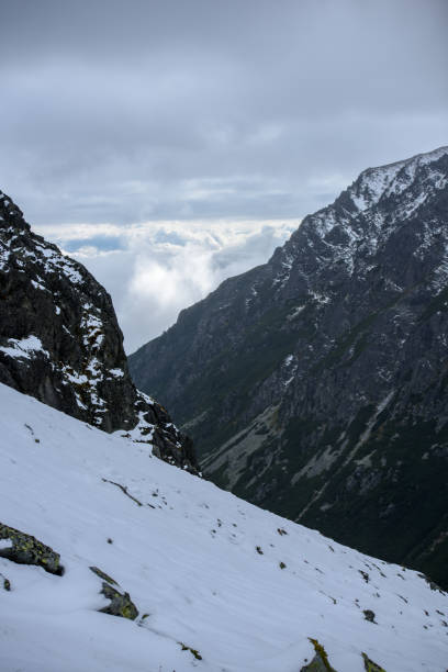 istock snow covered mountain tourist hiking trails 1134851230