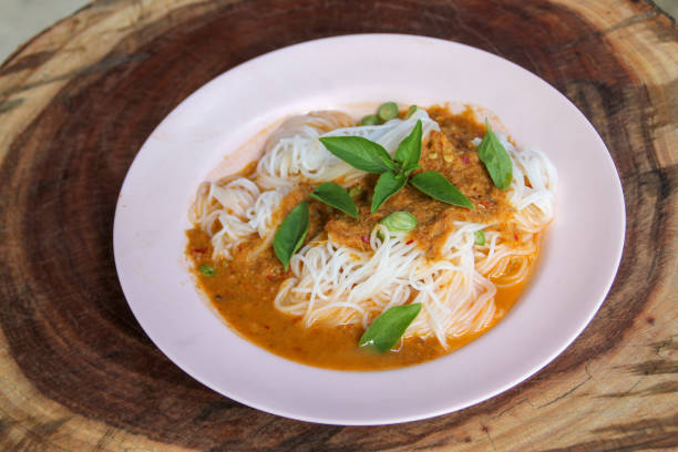 istock steam thai rice vermicelli with red curry and vegetable 1134854158