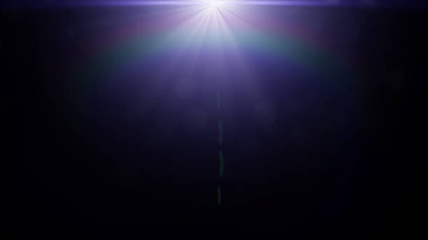 istock centred lens flare effect overlay texture with bokeh effect and light streak in purple and blue with black background 1134856926