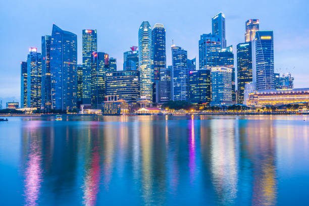 istock Illuminated Buildings By Bay Against Sky 1134862389