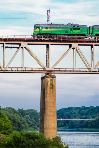 istock Green Cargo Locomotive on High Bridge 1134862808
