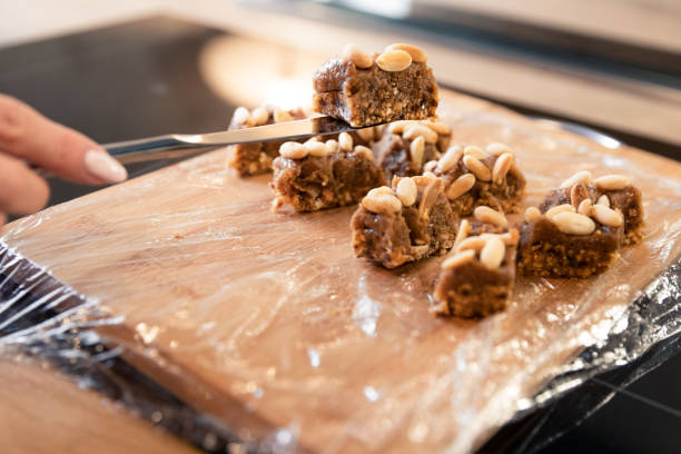istock Peanut Bar Cooking Process in Chocolate Glaze 1134863837