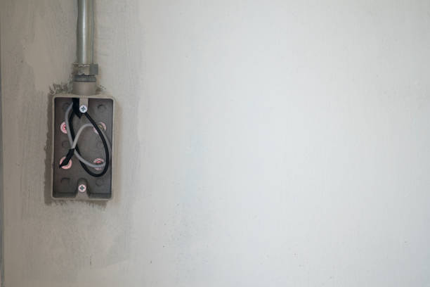 istock The switch hangs on the wires. Connect the wires during home renovation. 1134865811