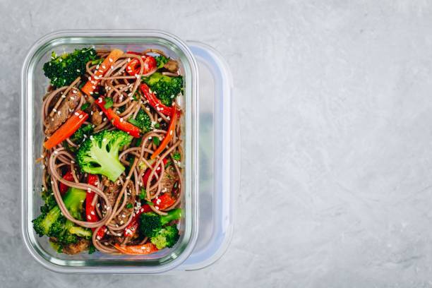 istock Beef broccoli noodles stir fry meal prep lunch box container 1134866019