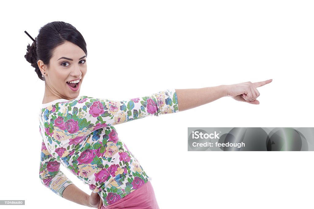 surprised woman pointing to the side  Adult Stock Photo