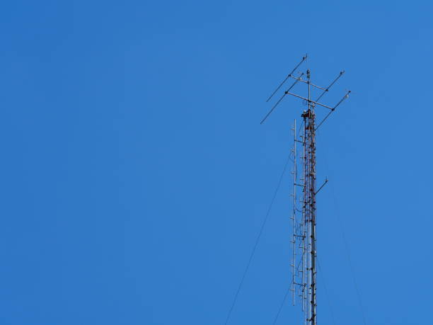 istock Repeater towers against lovely blue sky with clouds 1134871667