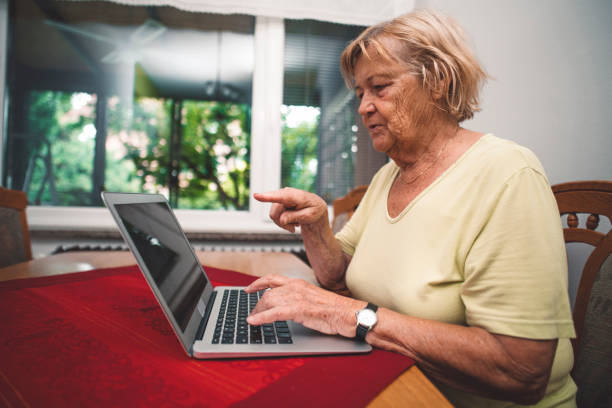 istock Mature woman surfing the internet 1134871749