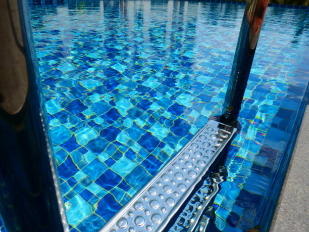 istock Blue swimming pool with stair 1134874723