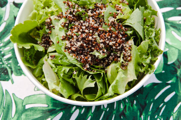istock Healthy Summer Salad on a tropical background 1134875273