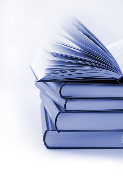 istock pile of books with one book open 113487595