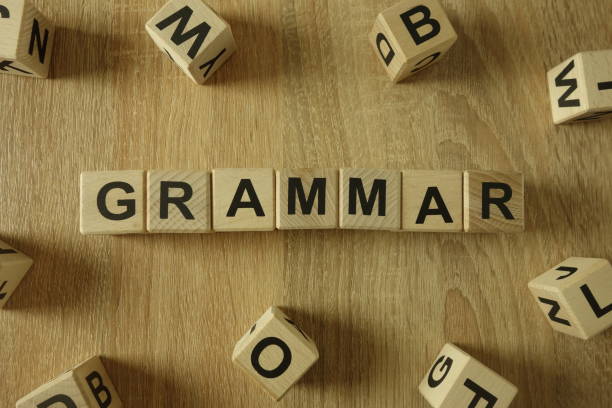 грамматические слова из деревянных блоков - культура англии стоковые фото и изображения