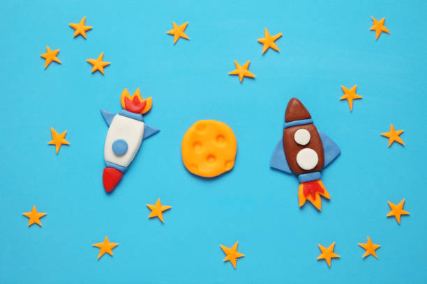 istock Two rocket in space, star, and moon. Plasticine art, cartoon 1134880859