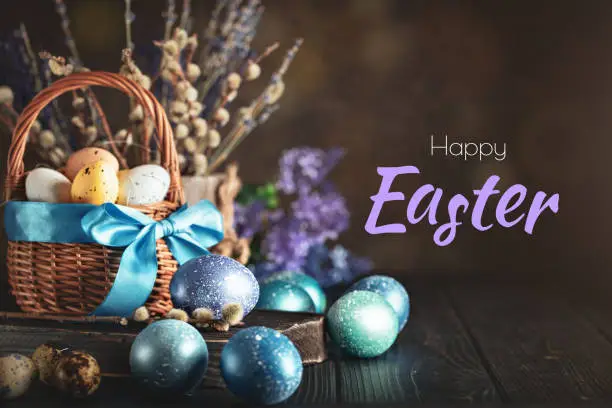 Photo of Happy Easter. Congratulatory easter background. Easter eggs and flowers. Selective focus.