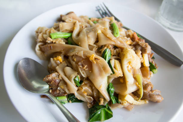 istock Stir fry noodles  in white bowl. 1134883668