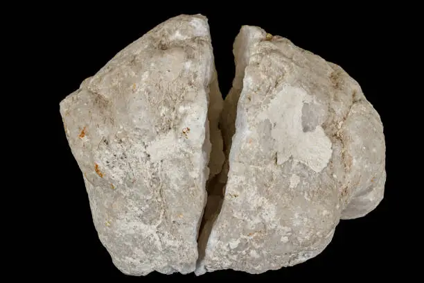 Macro mineral stone Quartz geode black background close up