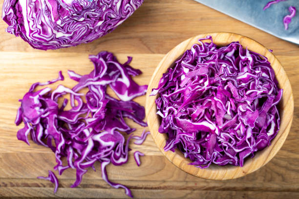 istock finely chopped purple cabbage in a plate on the table. 1134885565