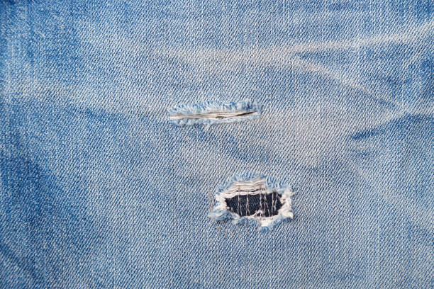 istock Abstract background of shabby and worn jeans 1134888911