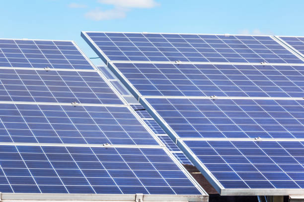 istock Close up rows array of solar cells or photovoltaics in solar power station 1134889277