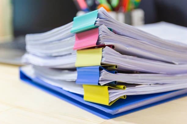 file folder and stack of business report paper file on the table in a work office - pile of newspapers audio imagens e fotografias de stock