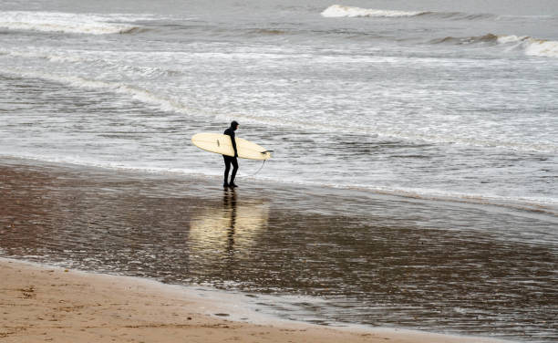 istock Surfer Ready to Ride the Waves 1134892755