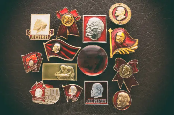 Photo of Soviet badges with the image of Communist leader Vladimir Lenin