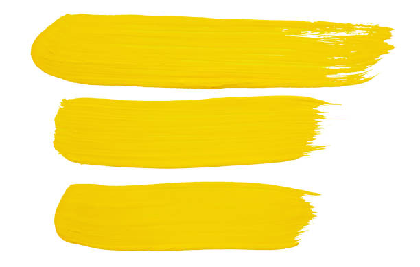 黄色いペンキの打撃 - ink and brush 写真 ストックフォトと画像