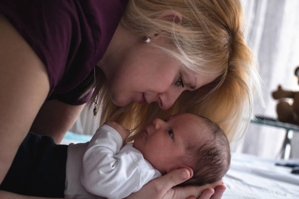 istock Newborn baby boy with mother 1134894708