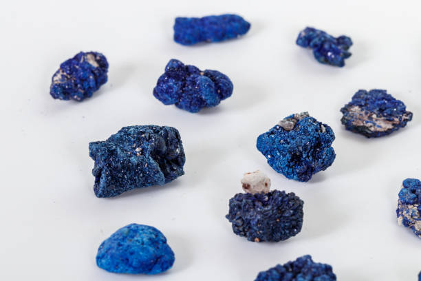 istock Macro mineral stone Malachite and Azurite against white background 1134896796