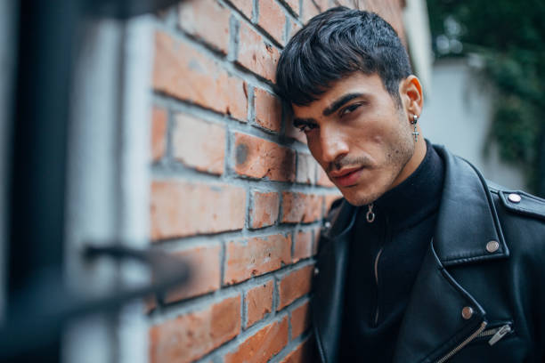 istock Serious young man in black clothing 1134898465