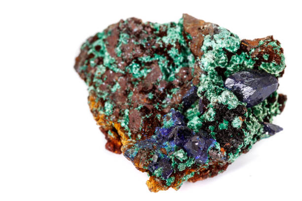 istock Macro mineral stone Malachite and Azurite against white background 1134898479