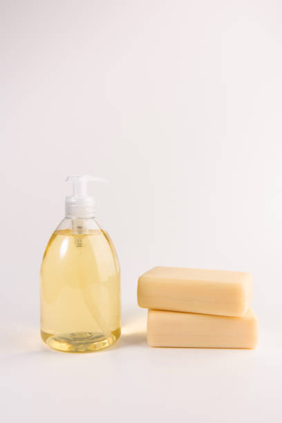 istock liquid soap and two pieces of solid soap isolated on  white background 1134900159