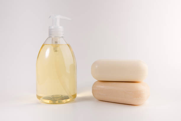 istock liquid soap and two pieces of solid soap isolated on  white background 1134900161
