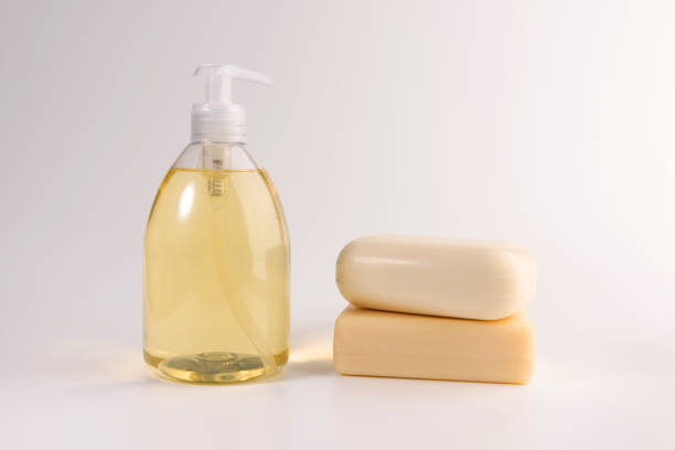 istock liquid soap and two pieces of solid soap isolated on  white background 1134900163