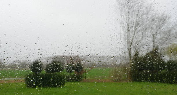 istock Close up Rain falling on a window in Belgium. 1134907122