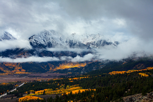 Autumn Below Winter on the Peak of Mount Elbert Coloroado.  Clouds breaking after a small storm.