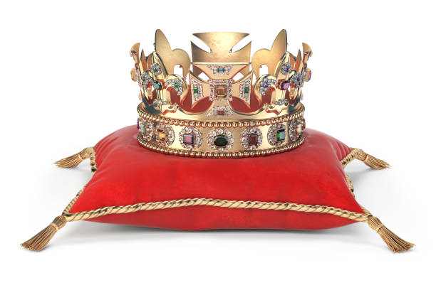 golden crown with jewels on red velvet pillow for coronation isolated on white. - red crowned imagens e fotografias de stock