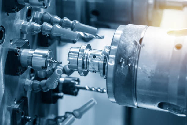 istock The CNC lathe machine making the thread at the metal shaft with drill. 1134910395